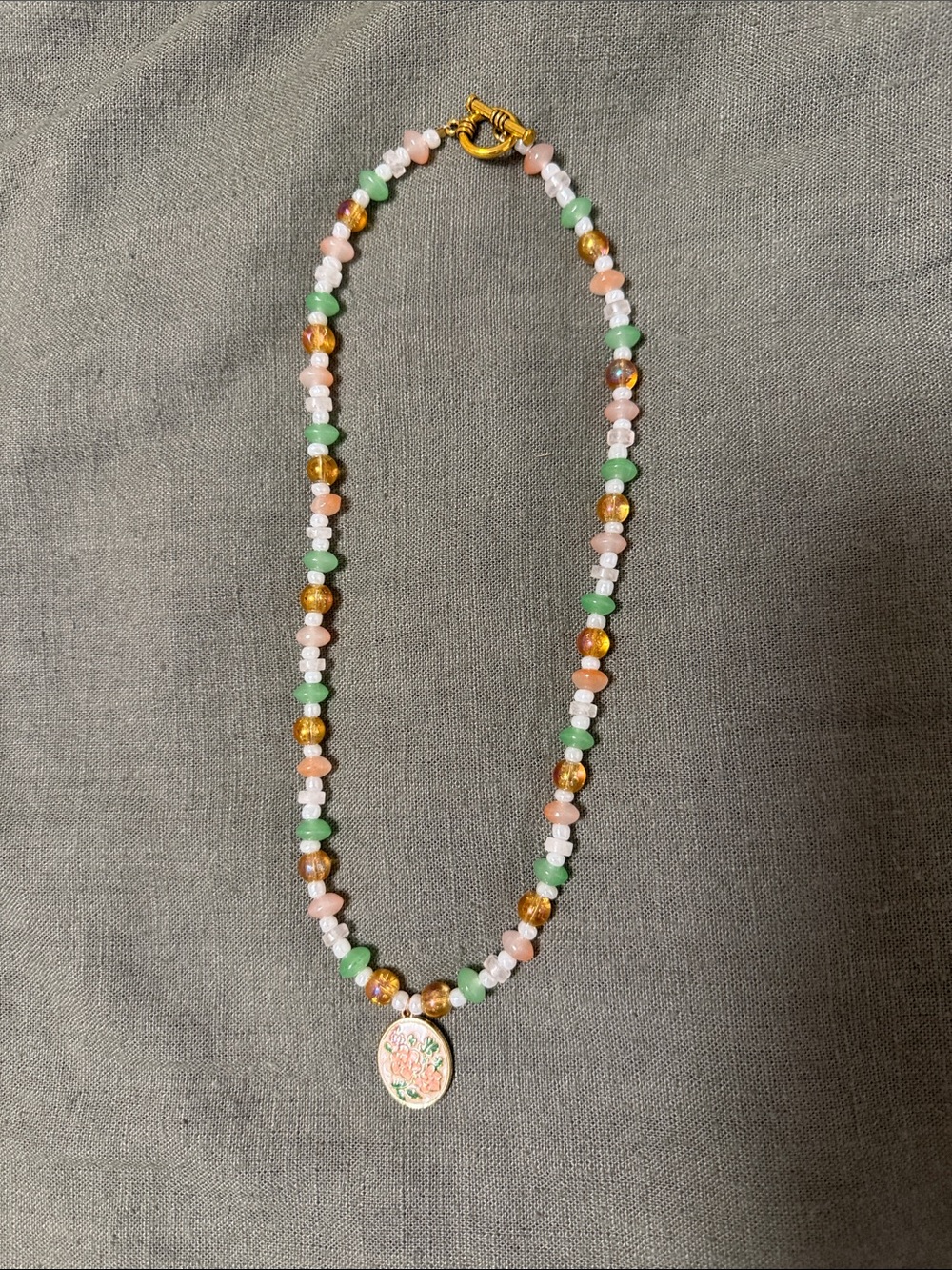 Handmade Multicolor Beaded Necklace with Floral Pendant